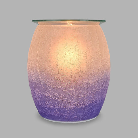 This Wax Melt Burner is designed with a striking purple crackle pattern that gives an elegant feeling to any room. The Ombre colour perfectly complements the crackle; making it look beautiful even when unlit. When turned on, the bright light shines through like a sunset, emphasizing the gorgeous colours.