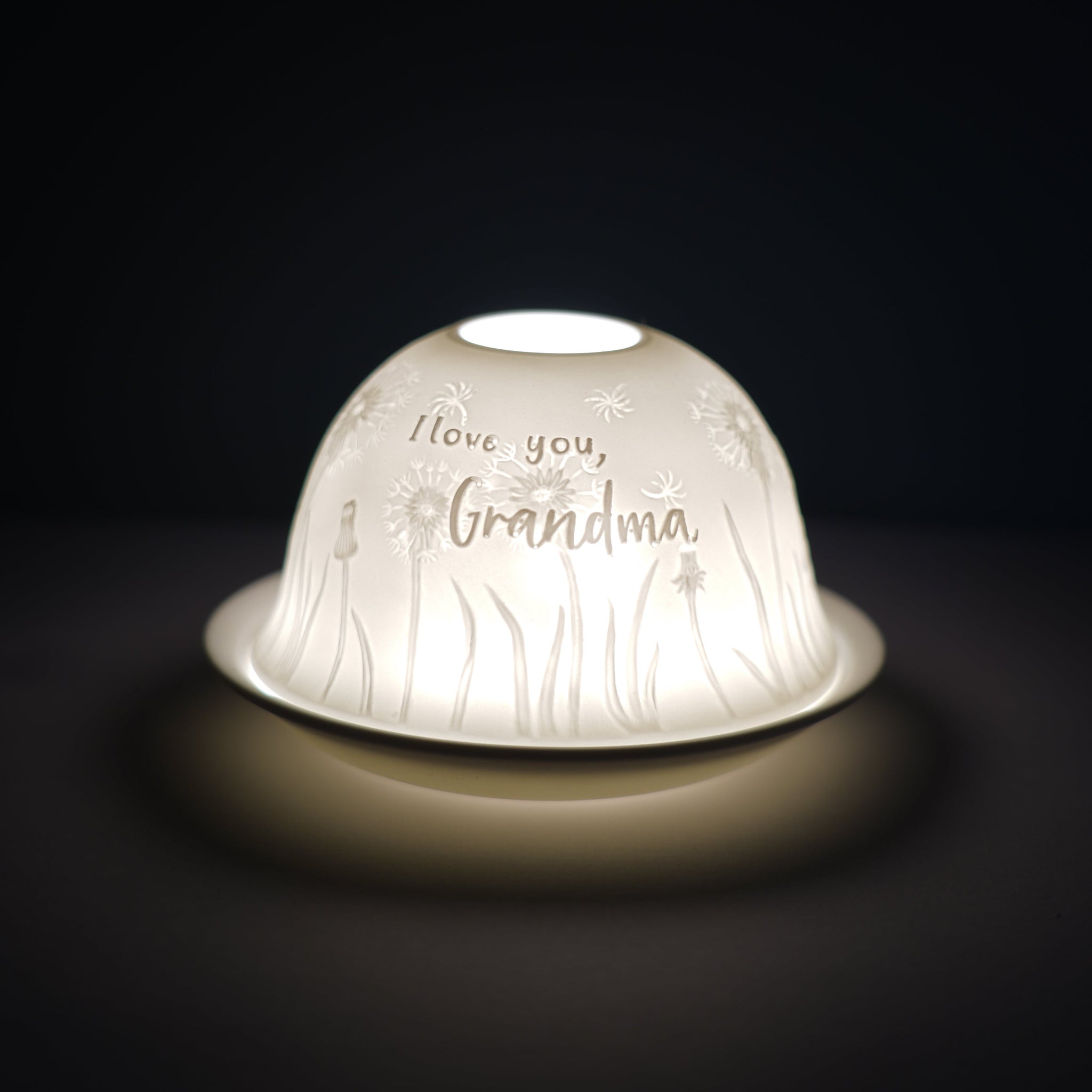 Cello porcelain tealight holder dome, in our one I love design. This design displays the text one I love over endless roses. We offer a wide range of porcelain tealight holders to let you choose your show stopping piece and show it off with pride when guests and family are over.  Pick your preferred option between LED lights or using tealight candles.